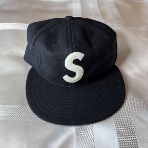 NWT Supreme black cap with white “S”.